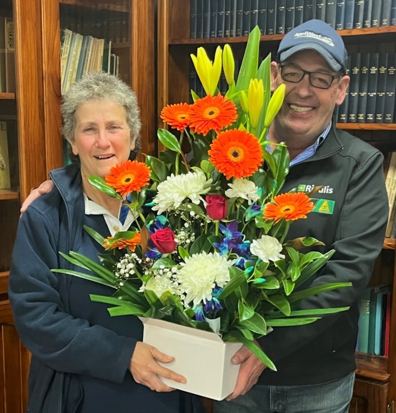 Helen Dohan receives flowers from Adam King